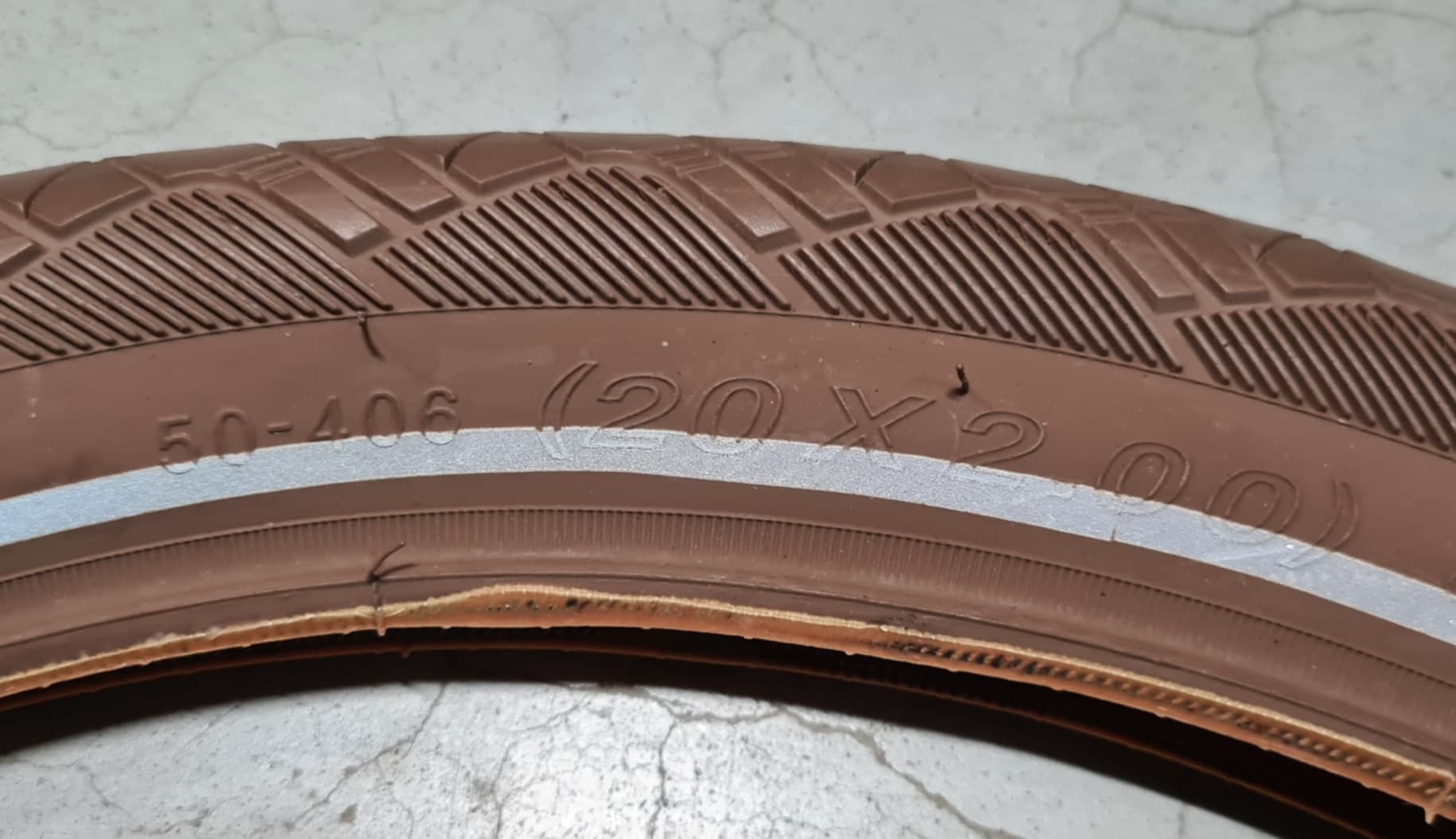 Dekk 50-406 (brun)